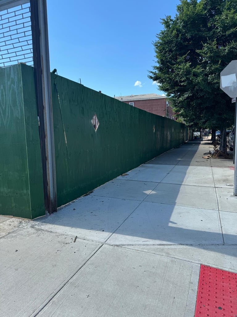Temporary construction fencing securing job sites, ensuring safety and restricting access