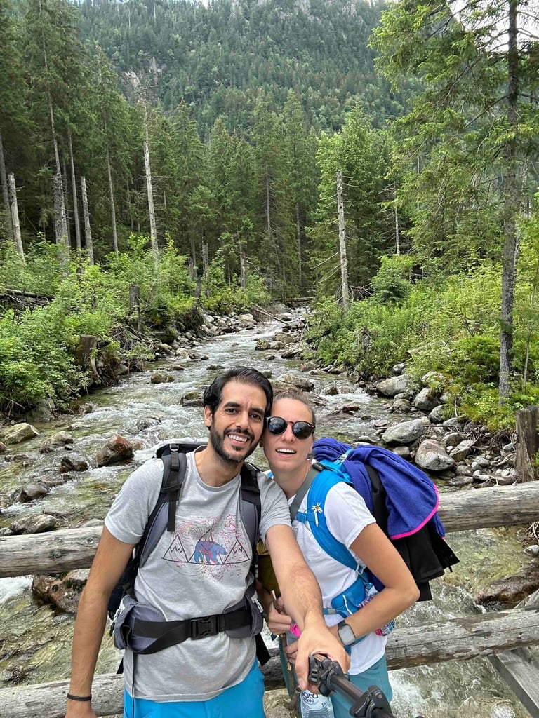 a couple taking a selfie in tatra mountain in poland