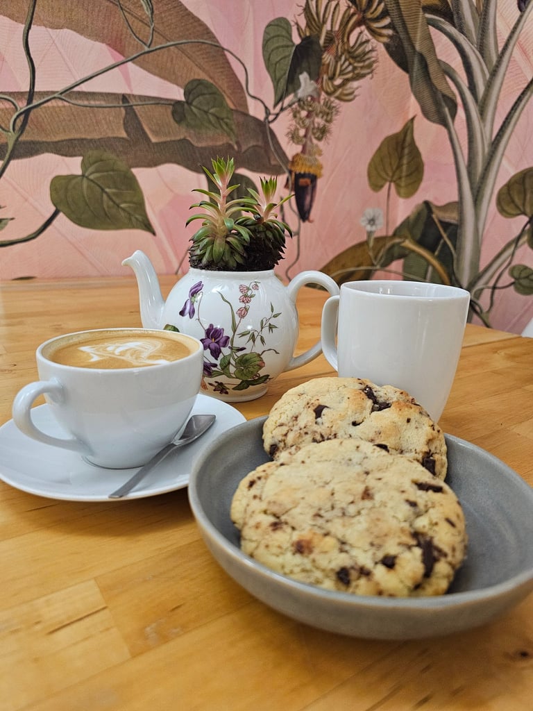 Dark chocolate and white chocolate cookie with a coffee cup