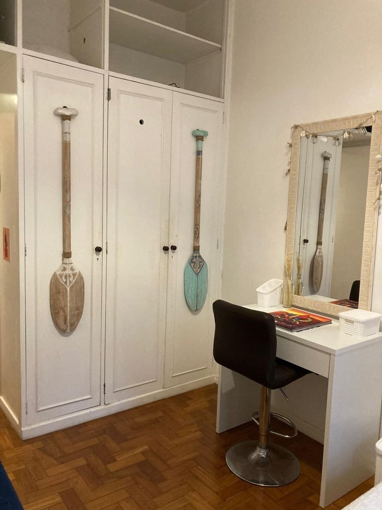 a bedroom with a guitar and guitar shaped guitar