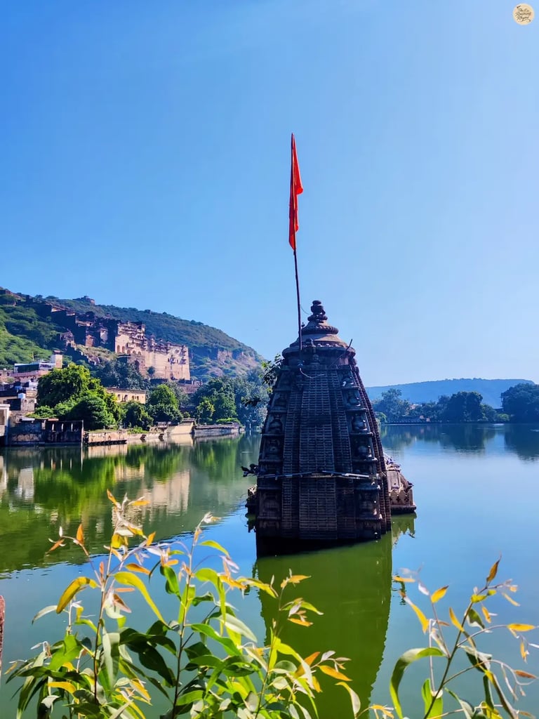 Half-submerged temple rising from the waters of Nawal Sagar Lake in Bundi, Rajasthan.