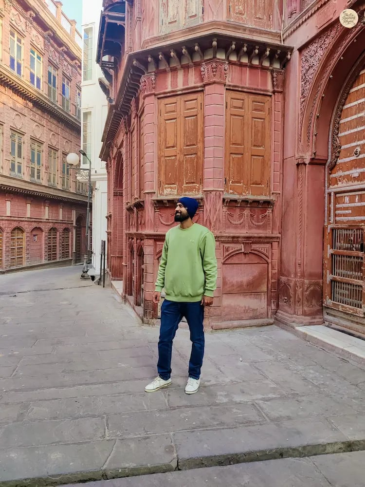 Rampuria Haveli in Bikaner, showcasing artistic beauty and red sandstone architecture.