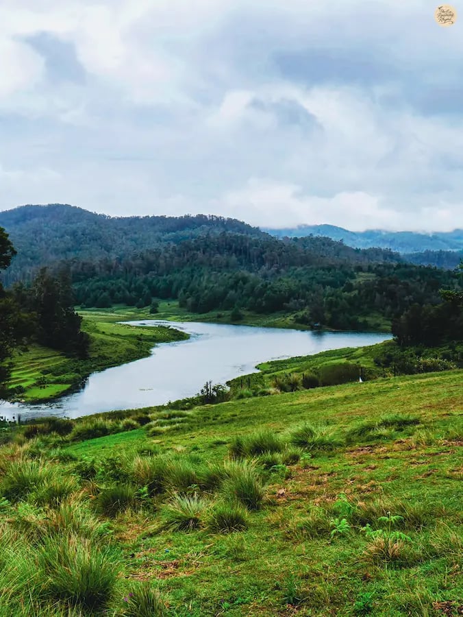 Heart-shaped Mannavanur Lake nestled among the rolling hills of Kodaikanal.