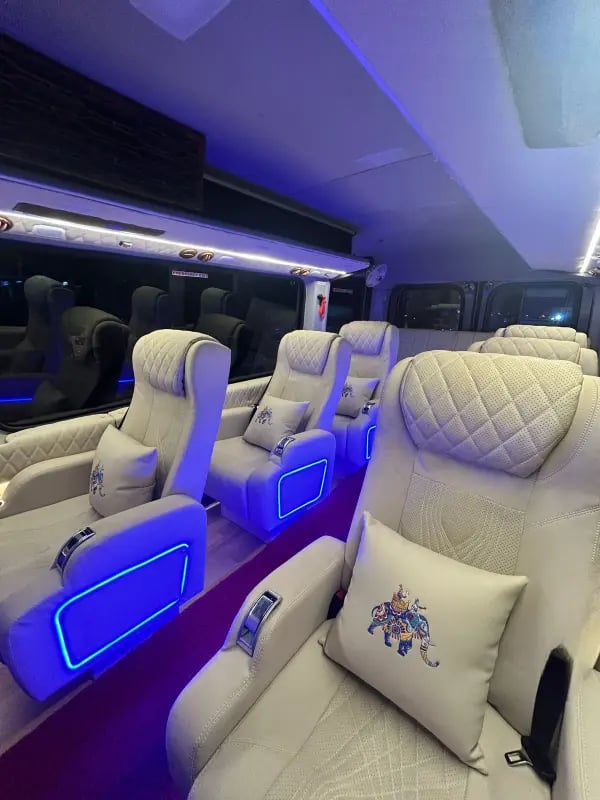Urbania luxury tempo traveller interior for rent in Delhi with premium seating and modern design