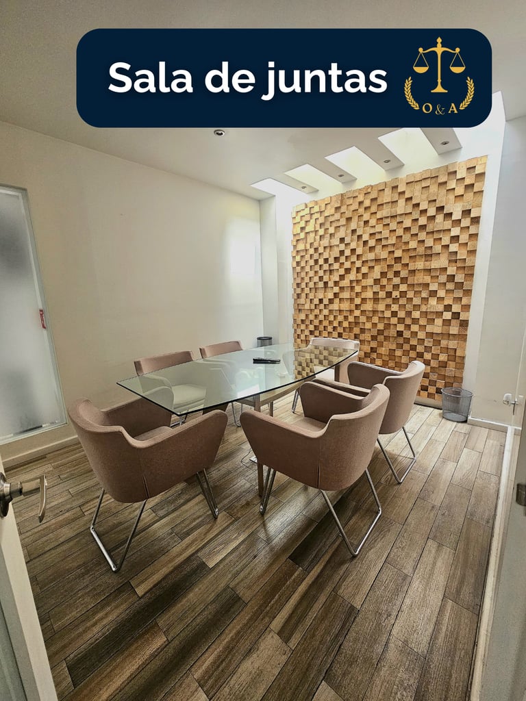 magen de una sala de juntas moderna, con una gran mesa rectangular de madera en el centro, rodeada.