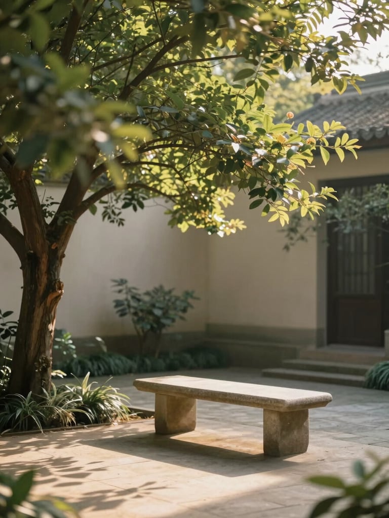 A peaceful garden courtyard corner with a stone bench under a large shade tree, soft golden hour light filtering through green leaves, serene atmosphere.