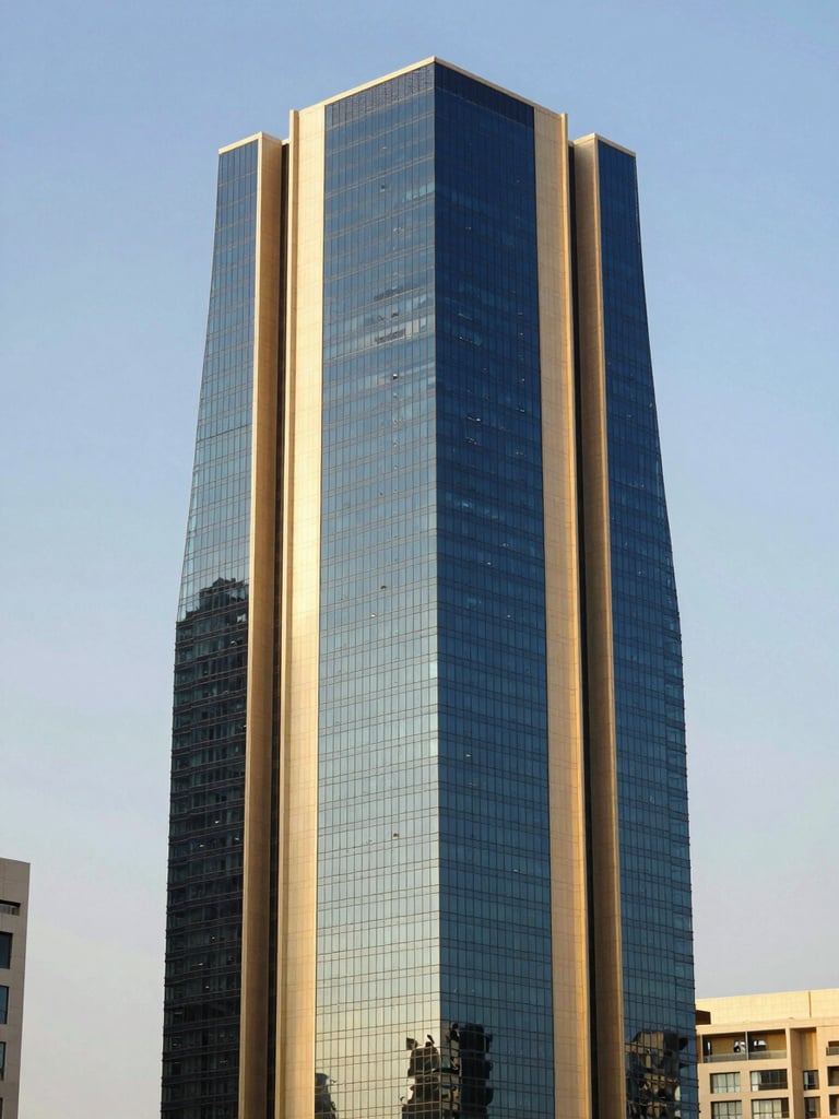 Modern architectural skyscraper in King Abdullah Financial District Riyadh, sharp focus, deep navy glass facade reflecting bright daylight, editorial style