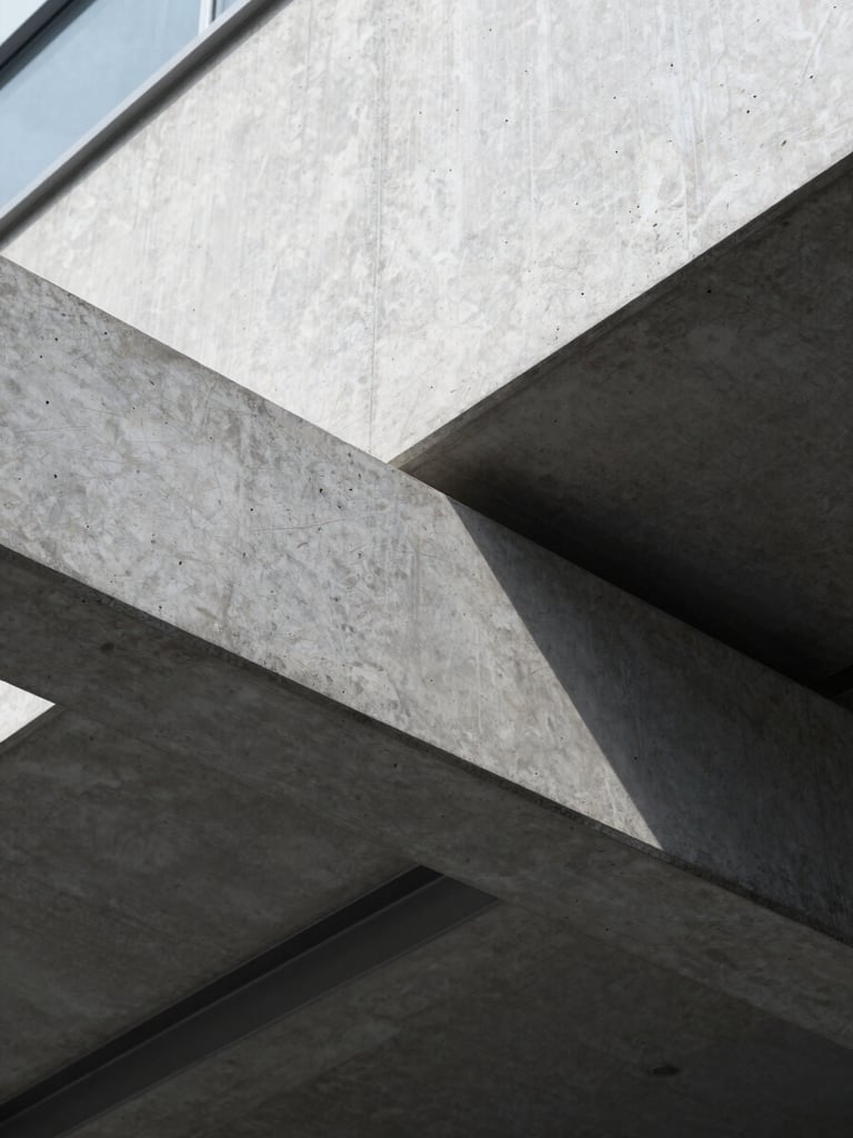 Macro detail shot of architectural concrete lines and steel beams, cool diffused daylight, sharp clean shadows, minimalist corporate geometry.
