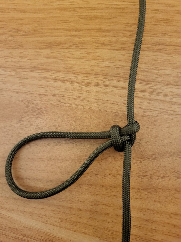 A Span loop tied with paracord. Non-binding and easy-to-tie
