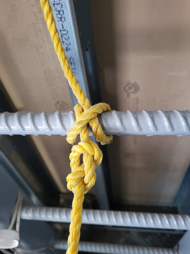 A Clove Hitch with a Figure 8 Knot as a stopper