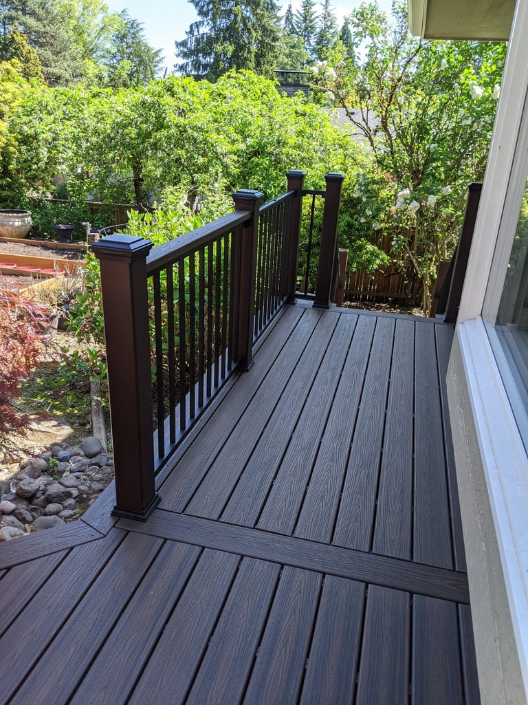 Composite decking with composite handrail