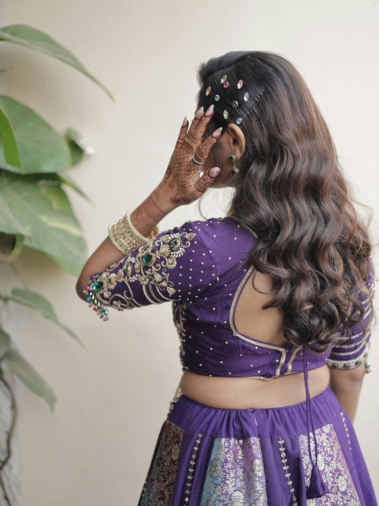Bridesmaid hairstyle with elegant jewelry by best salon in Gotri