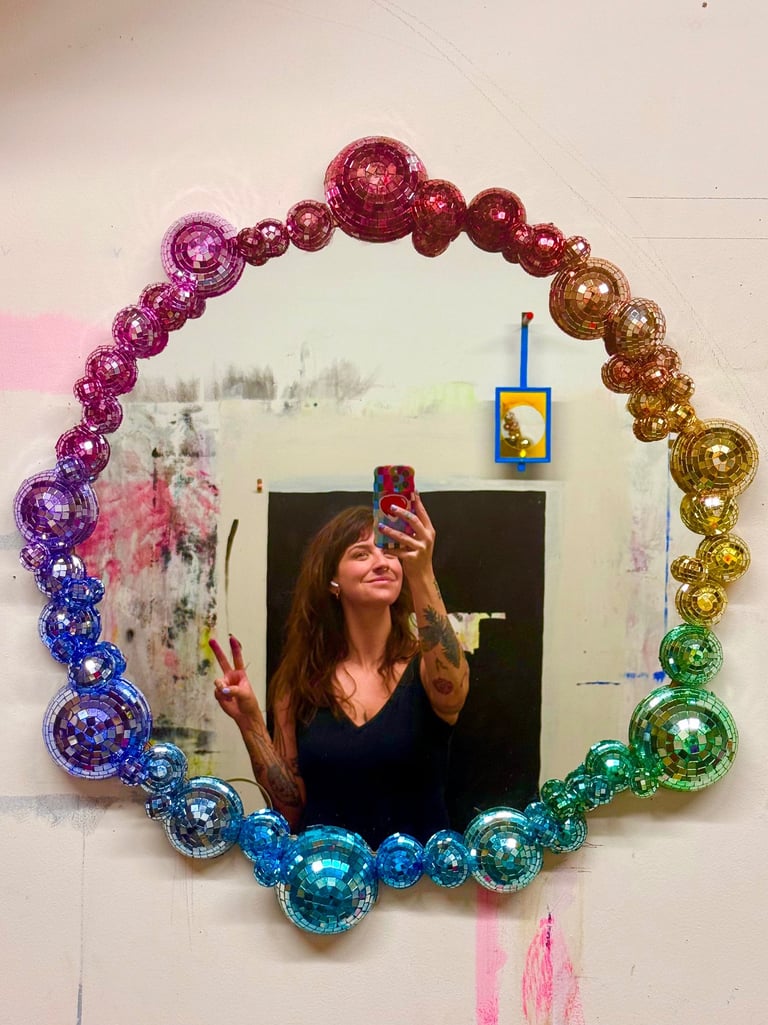 Selfie of Grayson in rainbow disco ball mirror 