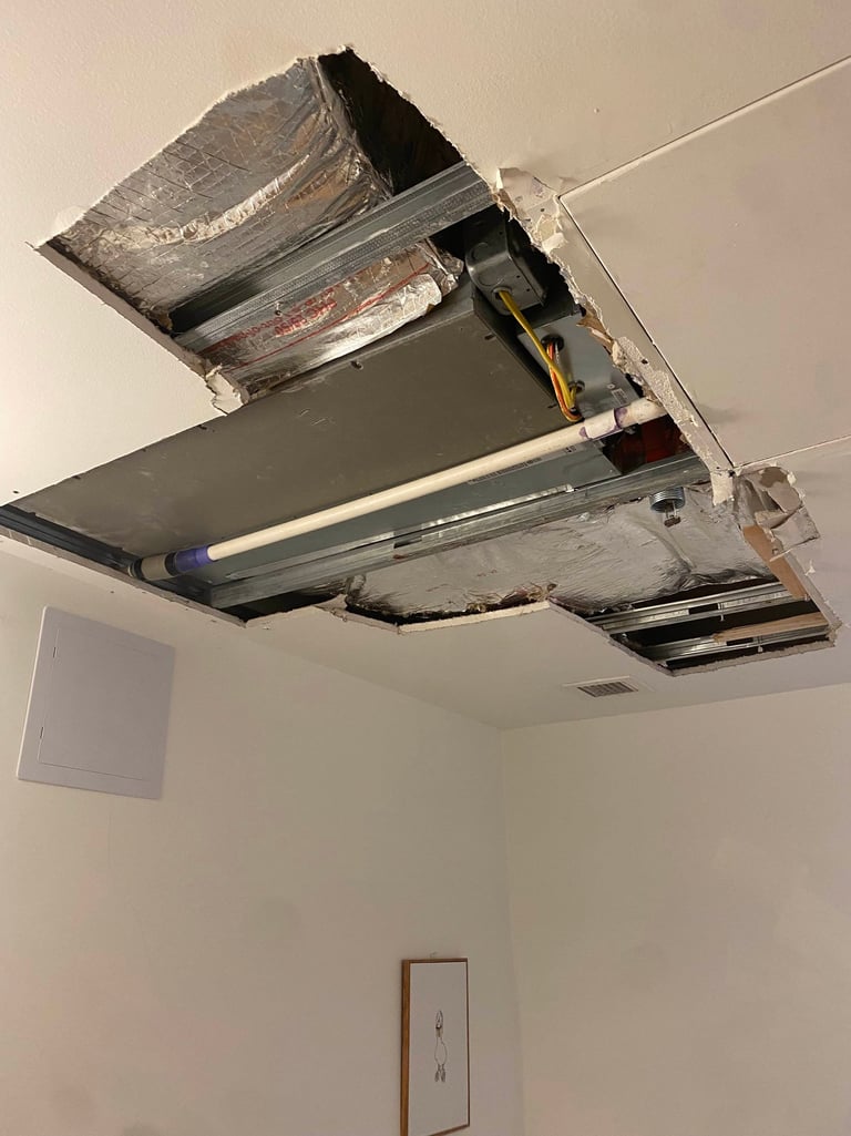 drywall cut out to access electrical wires