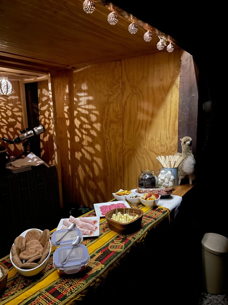 a table with a table cloth covered in food