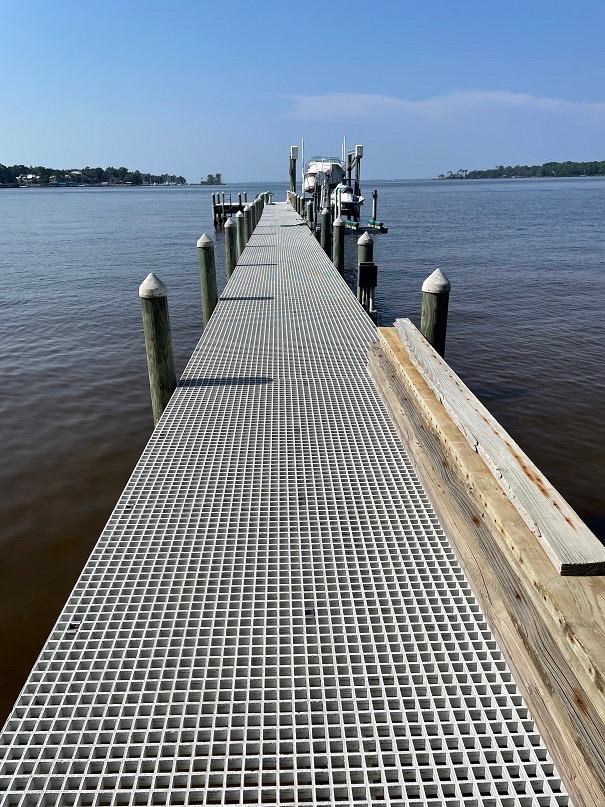 Grate clips being used to secure a boating dock.