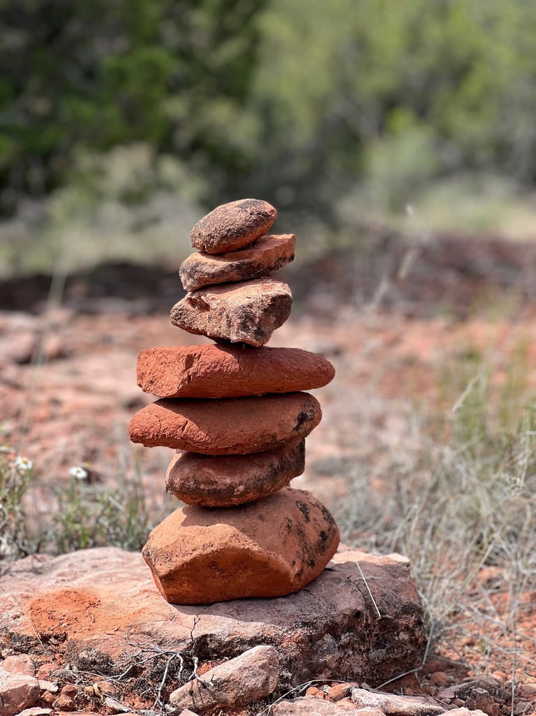 A real red rock stone cairn of 8-10 inches in the Sedona desert