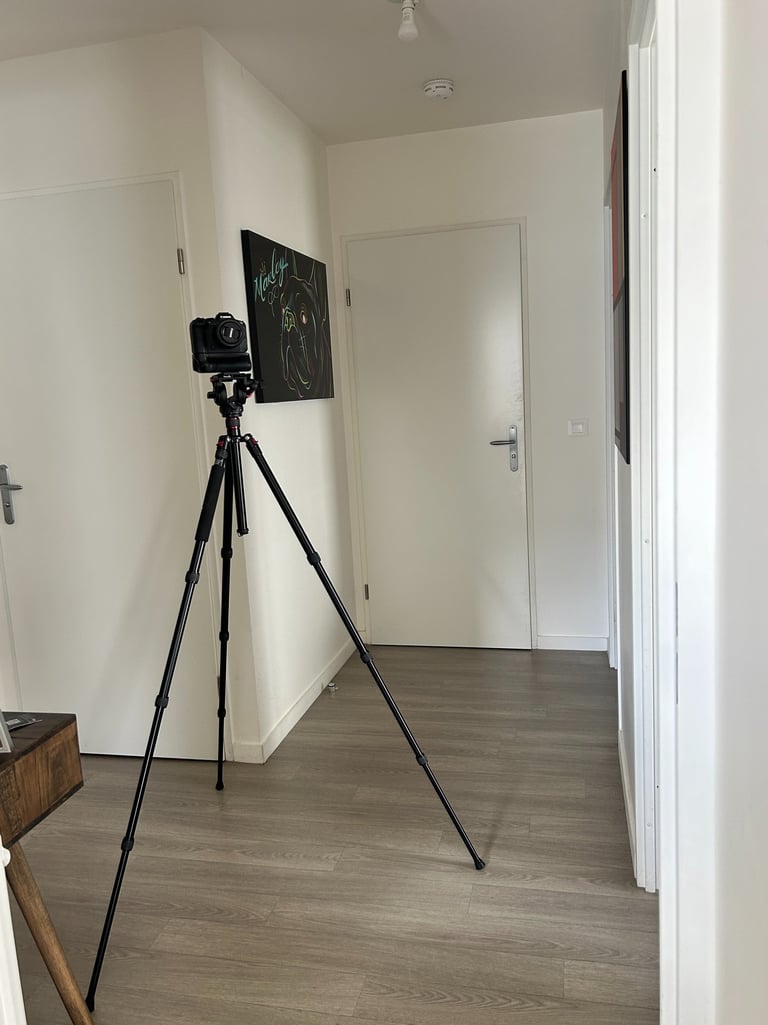 a camera and tripododge on a tripod