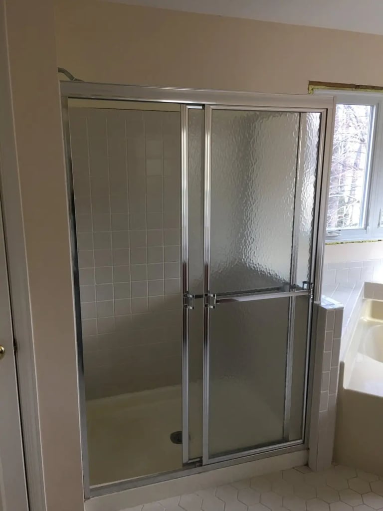 outdated walk-in shower.