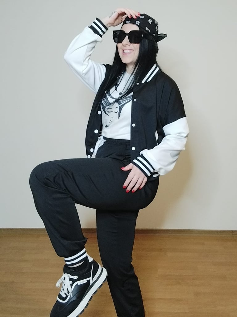 Black women's varsity jacket and pants 2-piece tracksuit set with cropped letterman jacket
