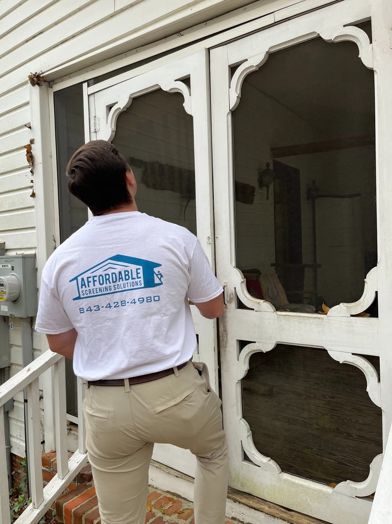 Custom screen door installation on a modern home in Myrtle Beach