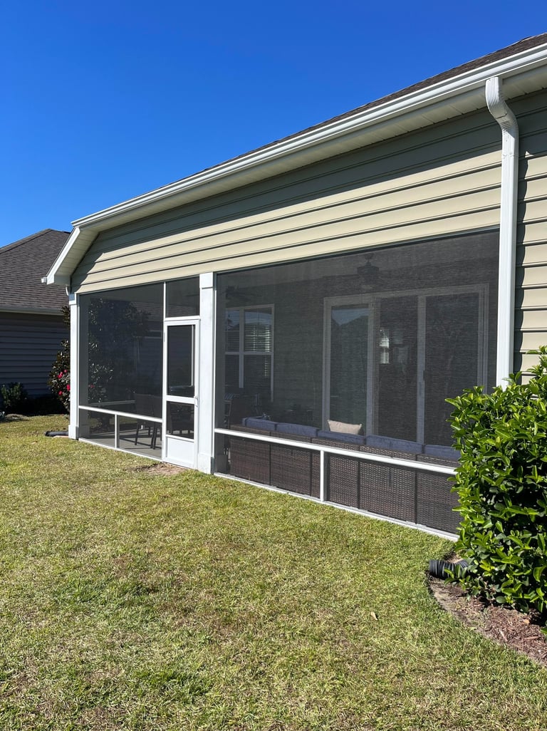 Aluminum screen system installed on a porch in Myrtle Beach, providing a sleek and durable solution.