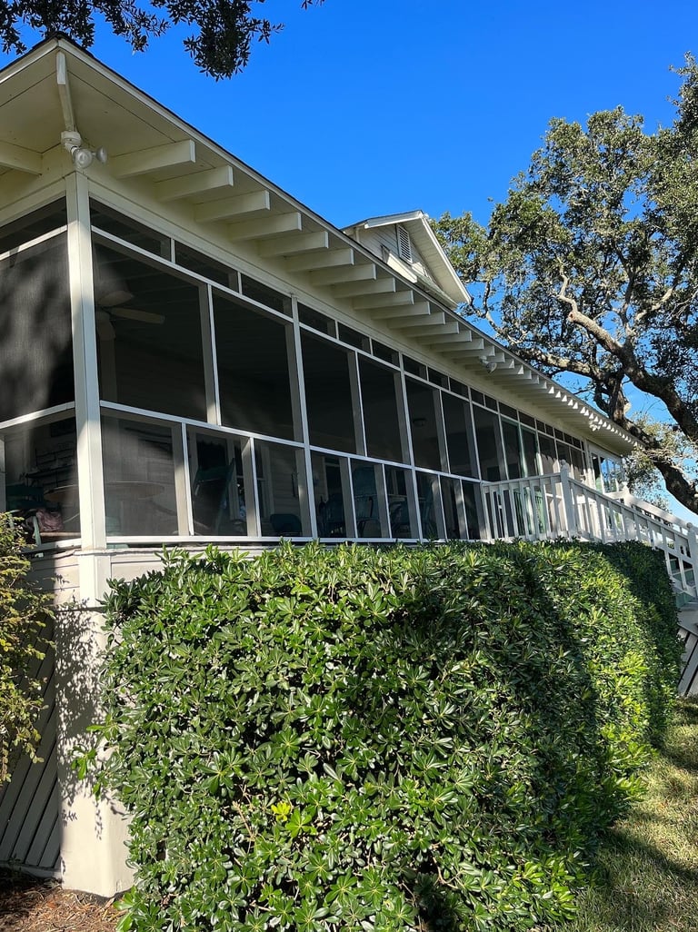 Modern screen porch design featuring durable materials and sleek construction.