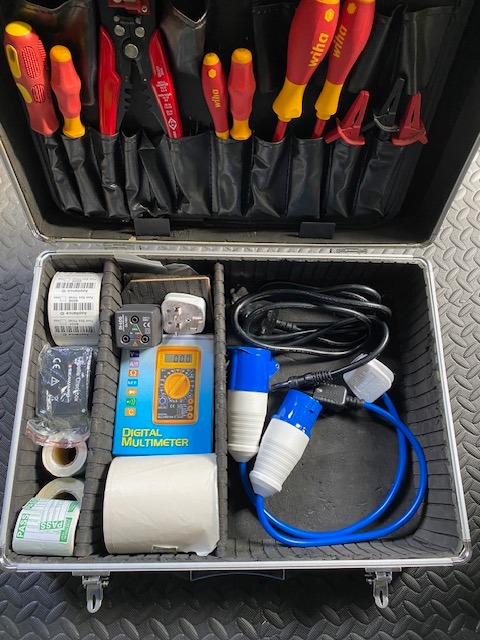 a tool kit with tools and equipment in a case