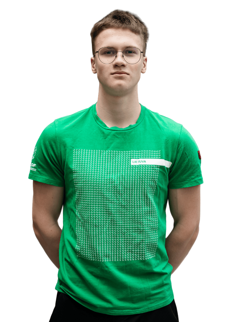 a boy in a green shirt