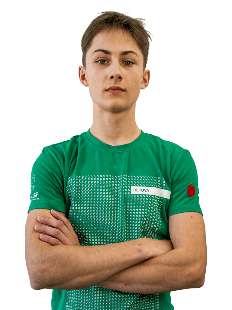 a boy in a green shirt