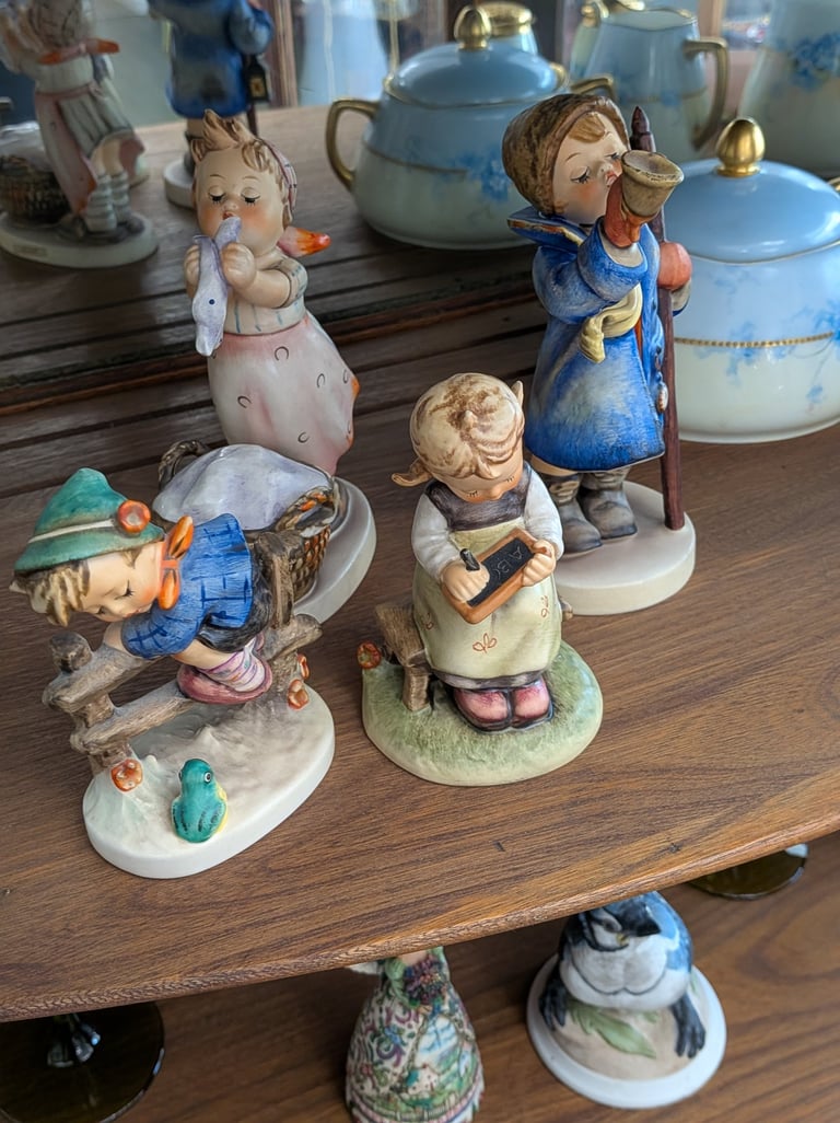 Goebel Hummel porcelain figurines.