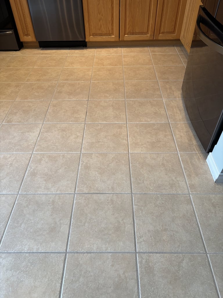 Clean and shiny ceramic kitchen floor after professional cleaning