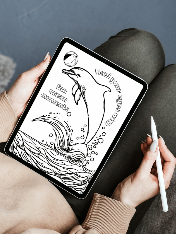 Digital tablet showing a dolphin coloring page with an Apple Pencil for creative ocean art.