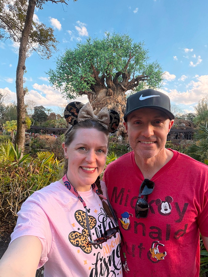Aimee Cochrane and husband pictured at Disney's Animal Kingdom® inside Walt Disney World®.