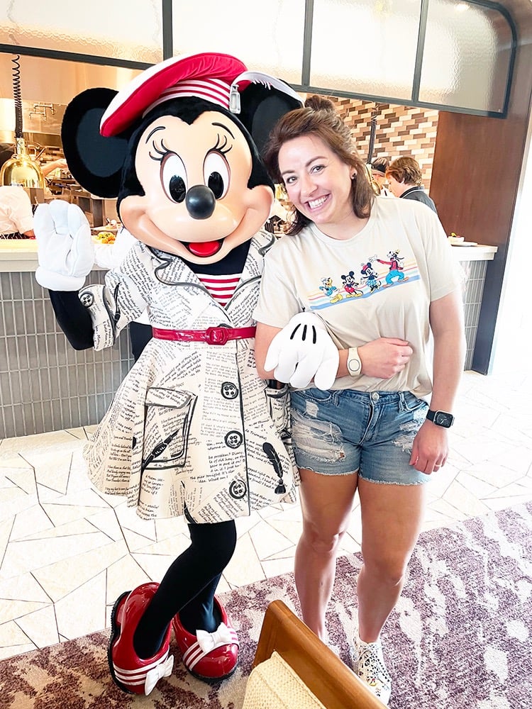 Dasee Johnson pictured with Minnie Mouse at Walt Disney World®.