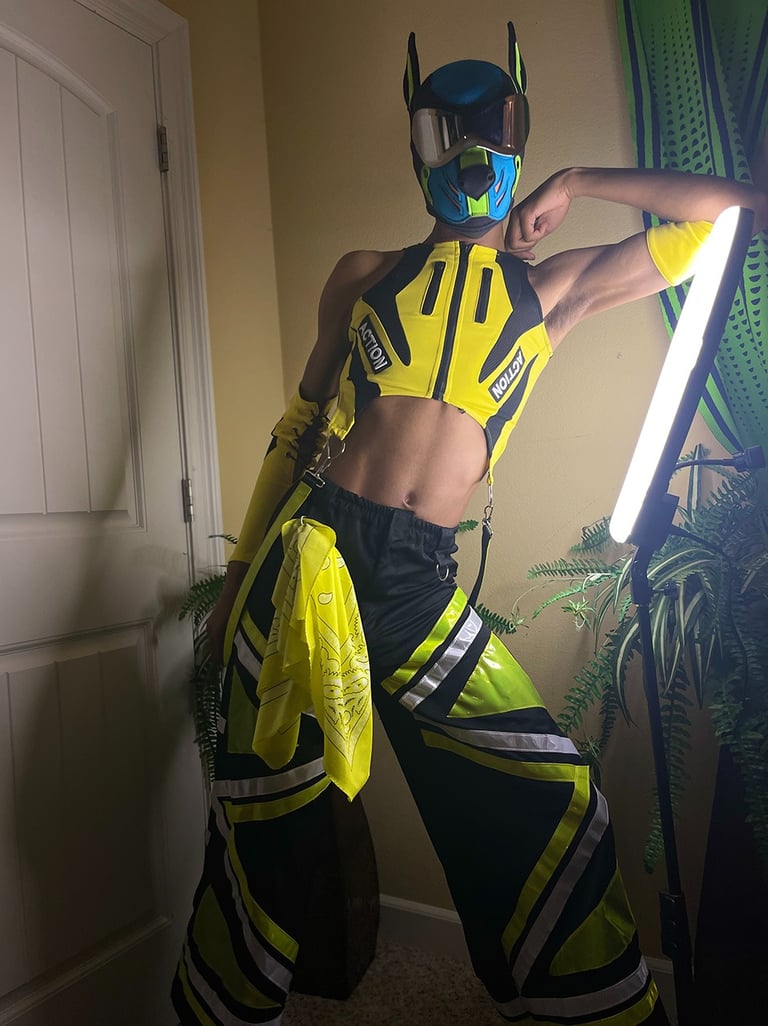 Man in a pup mask in a fashion pose.