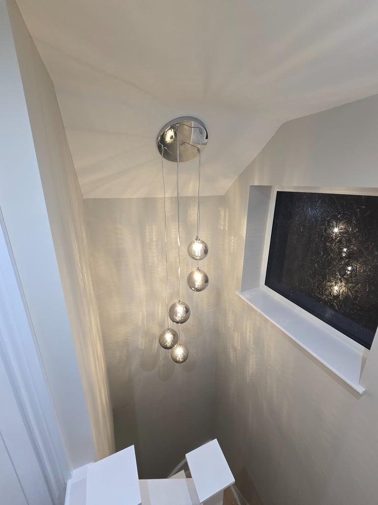 Hanging light in the stair well installed by Easy Spark Ltd in Bromley Kent