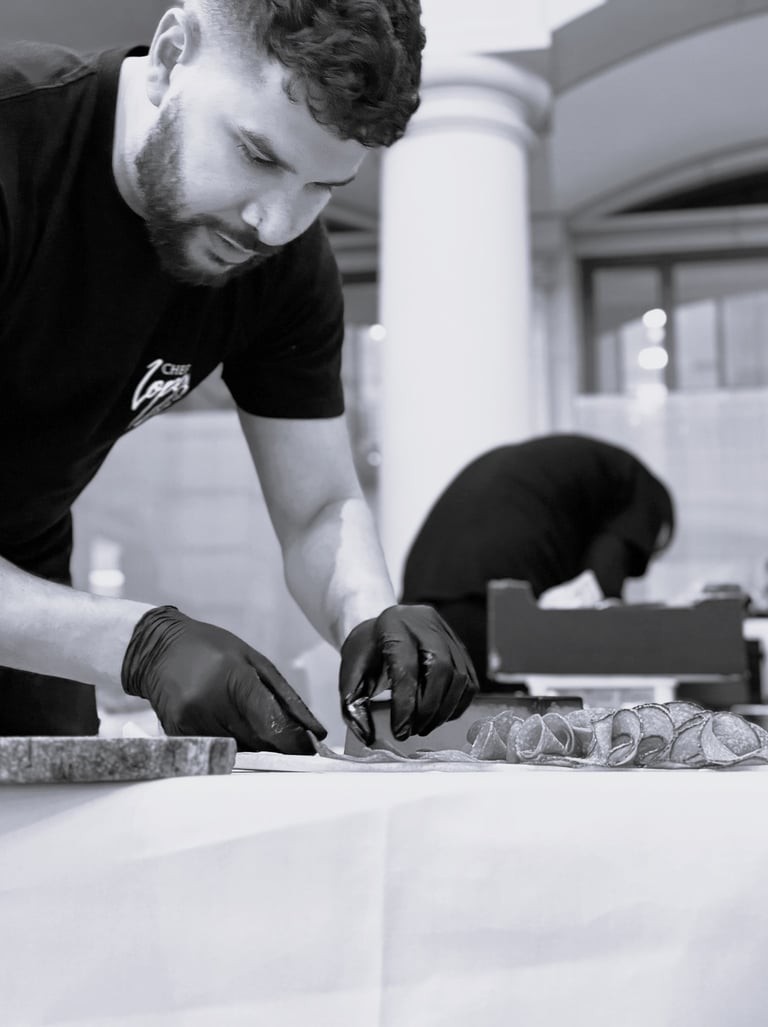 Chef Lopez Catering chef preparing food for private event catering service