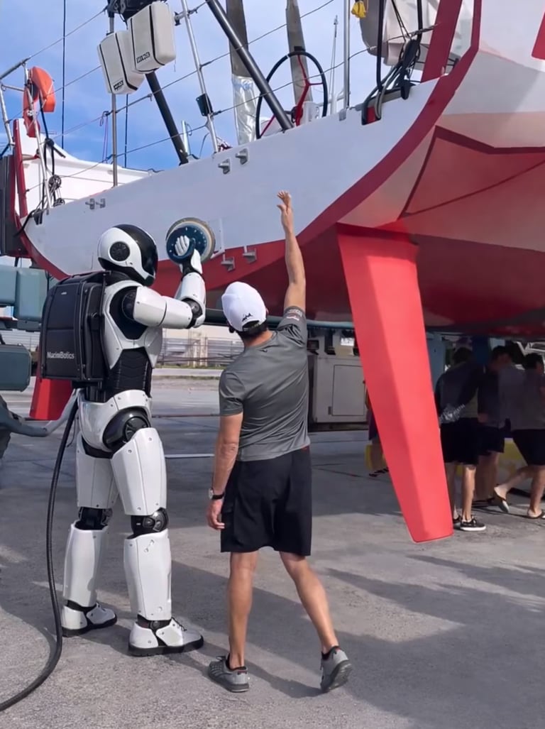 robotic system performing hull polishing on yacht  in shipyard