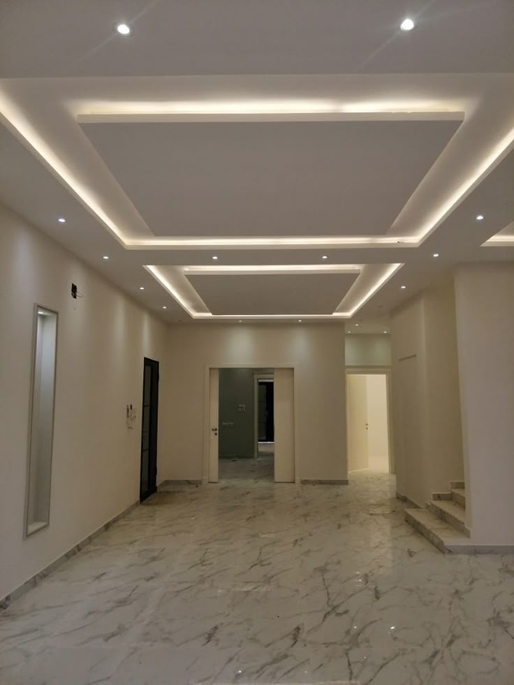 a room with a ceiling fan and a ceiling fan