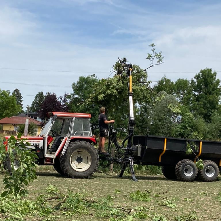 a tractor with a trailer attached to it