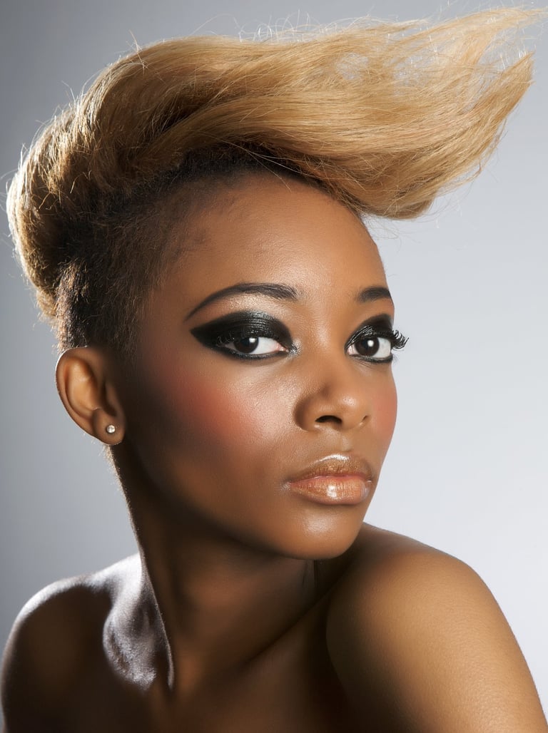 Woman displaying fashion makeup and hair