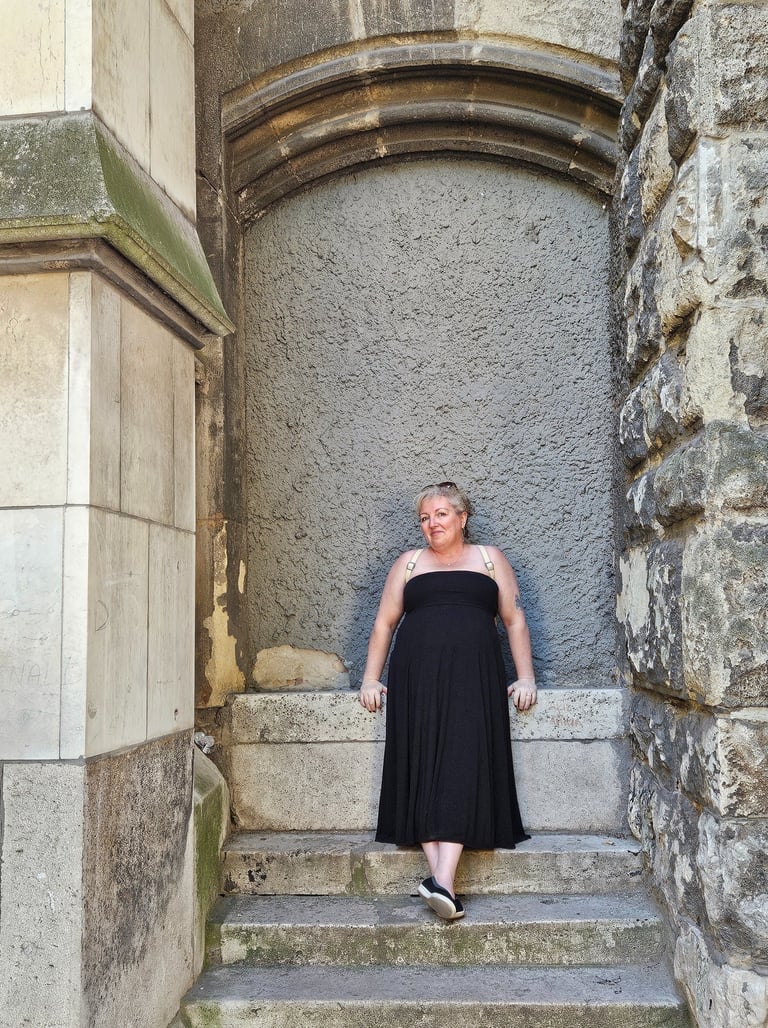 Amy in her fun dress invites you to see how we can work together to make your work shine