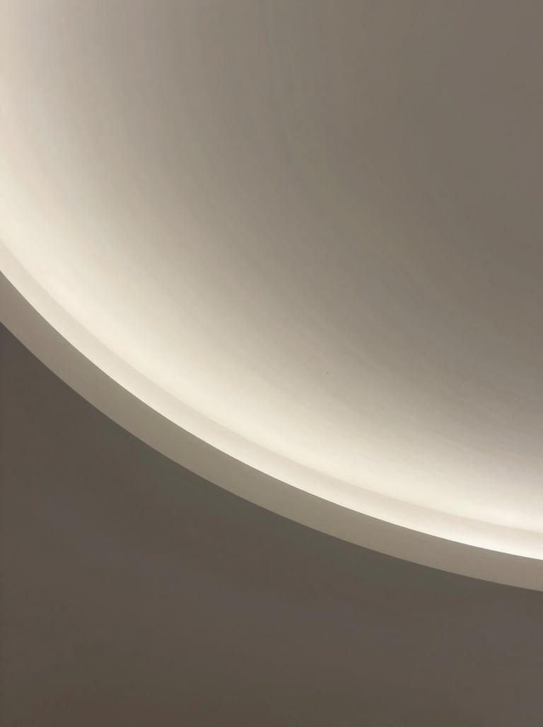 Minimalist architectural detail of a curved concrete ceiling, soft diffuse light, ethereal atmosphere, sand and charcoal tones #F9F7F2 #333333