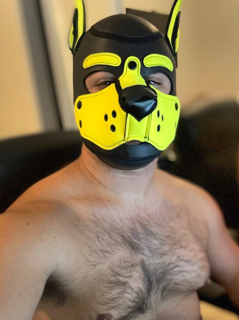 Man in yellow pup mask.