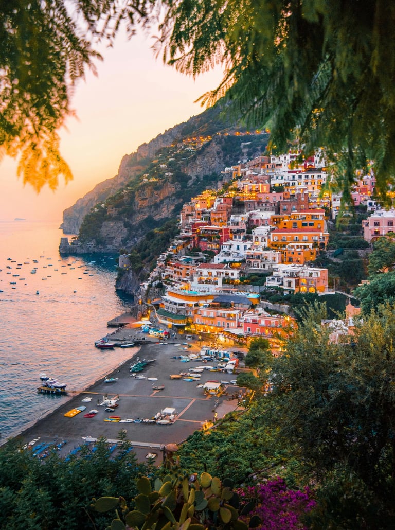 Colourful hillside village in Amalfi coast, at sunset overlooking the sea.