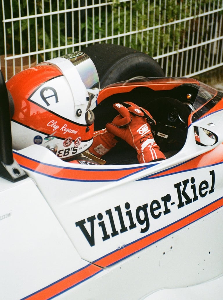 a race car driver getting ready before the race