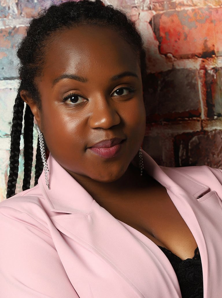 a Black woman with a pink jacket and black top