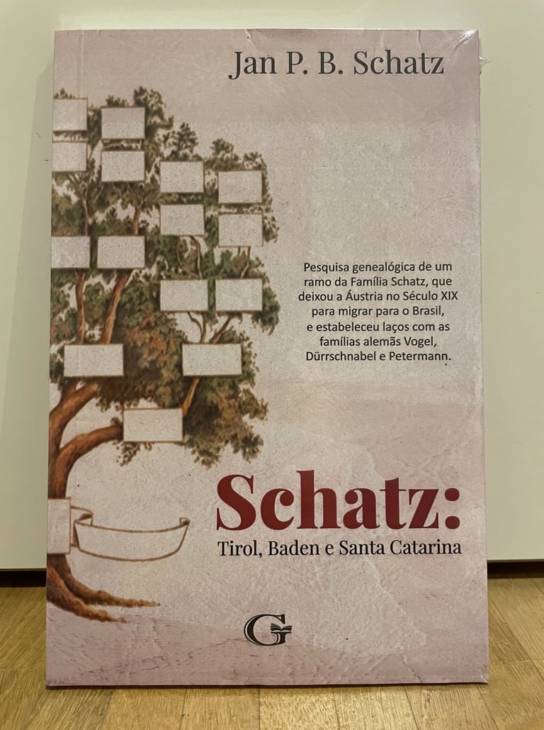 a book with a picture of a tree in the background