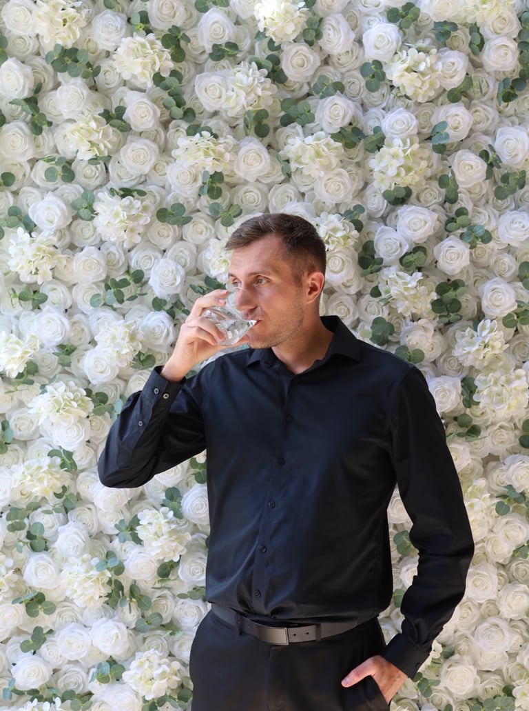 Event backdrop featuring a luxurious white rose flower wall rental in Shakopee, Minnesota